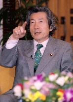 Koizumi does not rule out cabinet reshuffle after April